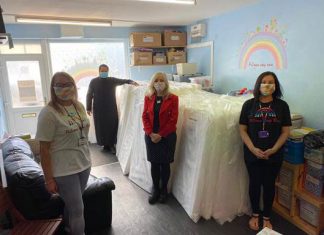 Retailer Kiddies Kingdom donates 40 50 cot mattress Kiddies Kingdom with Rainbow Baby Bank volunteers